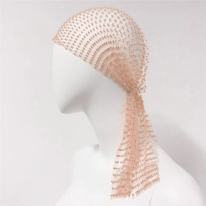 Detailed view of champagne mesh headscarf with shimmering rhinestones for party styling