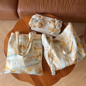 Artistic canvas tote bag set with marble ink print and matching hair scrunchies