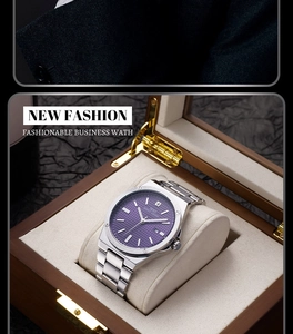 Detail of IBSO men's business watch with purple grid dial and silver steel band in box