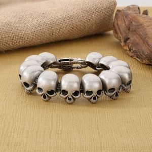 Close-up of vintage skull bracelet links in antique silver with gothic metal buckle