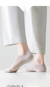 Close-up of breathable cotton no-show socks in beige with fine knit texture