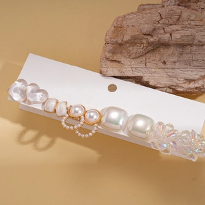 10-piece resin pearl heart and flower earring set on elegant white display card