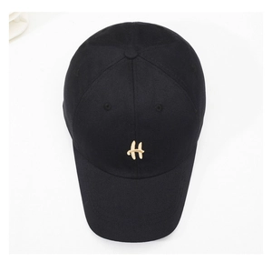 Overhead view of a black baseball cap with high-density cotton and gold 'H' embroidery