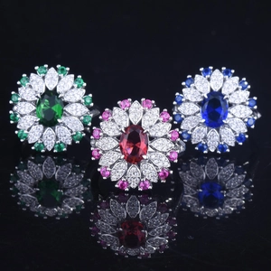 Three heavy luxury flower rings with 2ct blue, green, and red sapphire-style gemstones