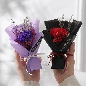 Mini dried flower bouquets with carnations in purple and black wrap for gifts