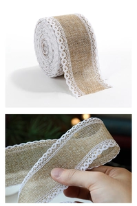 Detail of natural jute burlap ribbon with white lace trim for festive Christmas crafts