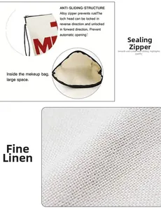 Detail of linen makeup bag with red letter M print and black alloy non-slip zipper