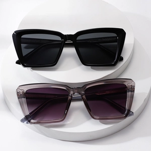 Classic square large frame sunglasses in black and translucent grey on a white display