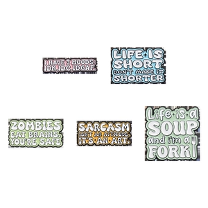 Set of five colorful enamel quote brooches featuring trendy English phrases and slogans
