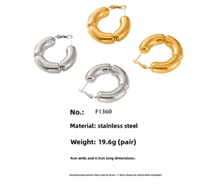 Polished bamboo style C-shape hoop earrings in gold and silver finish detail view