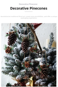 Natural pinecone ornament with green needles and red berries for Christmas tree decoration