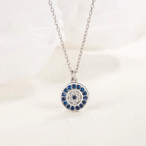 S925 Sterling silver Turkish Evil Eye necklace with blue crystals on white background