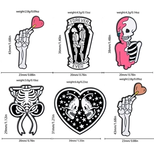 Gothic skull and heart enamel pins set with Forever Ever coffin and rib cage designs