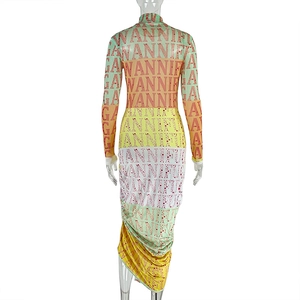 Detail of slim fit long sleeve dress featuring colorful GIANNI letter print on the back