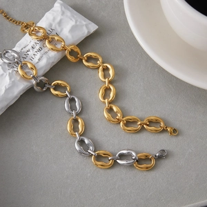 Luxurious titanium steel two-tone chain bracelet for women in gold and silver finish