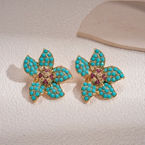 Ethnic style flower earrings in gold finish with turquoise and magenta rhinestone beads