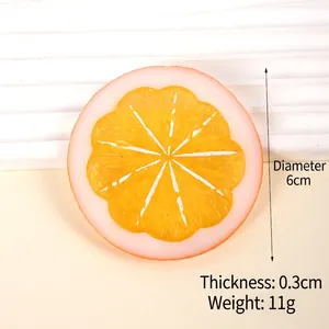 Bright orange PVC faux lemon slice prop for photography, 6cm diameter and 0.3cm thickness