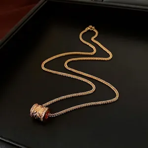 24k gold-plated necklace with vintage cylindrical zircon pendant on black leather