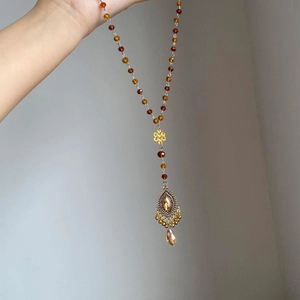 Collier ethnique vintage en perles de cristal ambre avec pendentif goutte d'eau