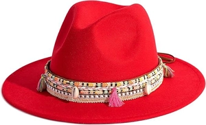 Detail of red wool felt fedora with bohemian braided band, tassels and shell accents