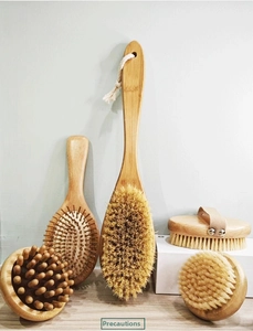 Detailed set of 5 natural wood body brushes with soft bristles and cotton hanging ropes