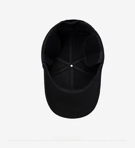 Detail view of the warm interior lining and ear protection on the wool baseball cap