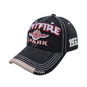 Close-up of SPARK and SPITFIRE 3D embroidery on black vintage cotton baseball cap