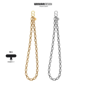Detail view of gold and silver crossbody phone chains with gasket and metal carabiners