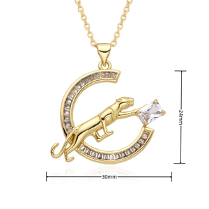 Detail shot of gold leopard pendant with white zircon accents, size 24mm by 30mm