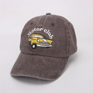 Close-up of vintage washed cotton baseball cap featuring classic car embroidery detail