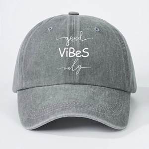 Close-up of good ViBeS only white lettering on dark grey washed denim baseball cap