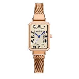 Detailed view of women's rose gold square quartz watch with Milanese mesh band