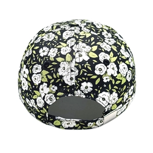 Detail of floral baseball cap back with silver metal adjustable buckle and floral print