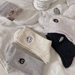 Chic knit mid-calf socks with cute animal embroidery and colorful speckled yarn detail