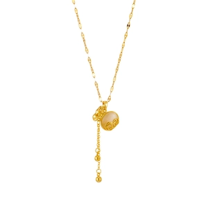 Gold plated lucky pouch necklace with cat eye stone and tassel on white background