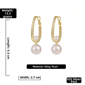 Detail of pearl drop earrings showing 5.5cm length and 12.3g weight on white background