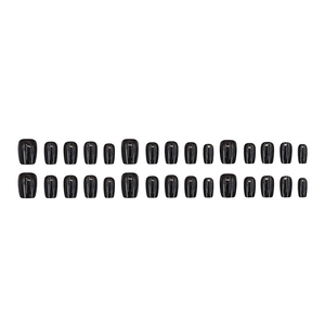 Glossy black short square press-on nails set with 24 pieces on a white background