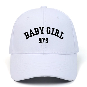 White cotton baseball cap with black BABY GIRL 90'S embroidery on a curved brim hat