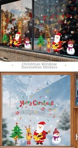Detail view of festive Christmas static window decals with Santa and musical notes on glass