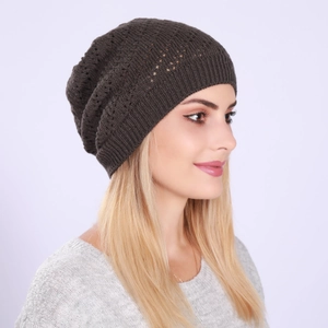 Detail of the hollow-out knit pattern on a dark slouchy beanie for men and women