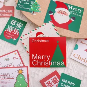 Festive Christmas bouquet gift tags with Santa and tree motifs on rustic wood tray