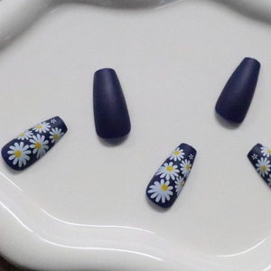 Matte navy blue long coffin press-on nails with delicate white daisy flower patterns