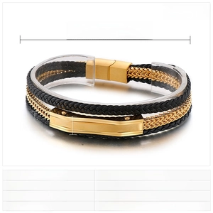 Detail view of multi-layer black leather punk bracelet with gold stainless steel chain