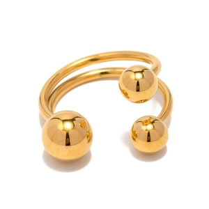 Bague ouverte en acier inoxydable plaqué or 18 carats avec un design unique à trois boules