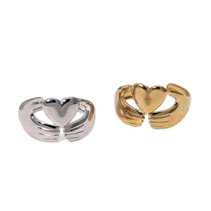 Polished stainless steel open rings with hands holding heart in gold and silver finish