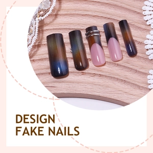 Long brown cat-eye fake nails with silver stars and pink French tips and ring detail