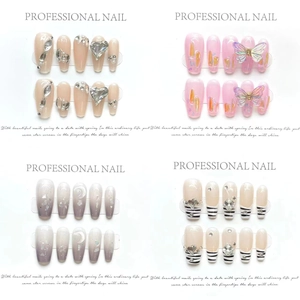 Coffret d'ongles faits main avec motifs papillons, dégradés pailletés et designs cerises