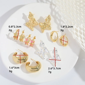 Minimalist gold and silver butterfly earrings and textured lava hoops set for women