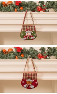 Detailed view of Christmas felt gift bags featuring plush snowman and reindeer motifs