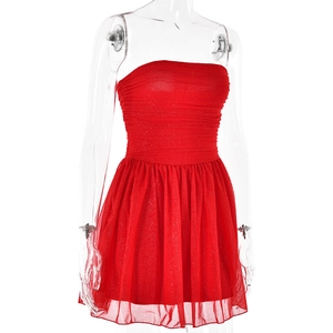 Detail of red sequin mini dress featuring ruffled bodice and tiered mesh skirt